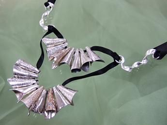 �f�U�C���܁@���ǗL�q